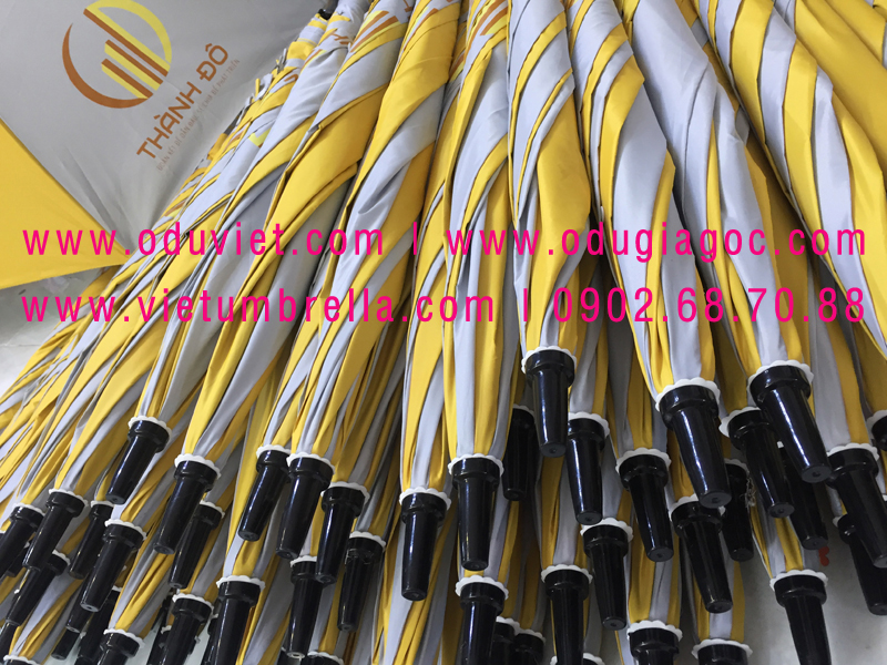 xưởng sản xuất ô dù cầm tay in logo quảng cáo